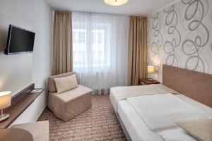 Letto o letti in una camera di Hotel Atlas