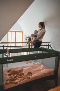 Posteľ alebo postele v izbe v ubytovaní Apartmány Jurica Boží Dar 88
