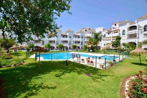 Bazén v ubytování Estupendo apartamento el la mejor ubicación nebo v jeho okolí