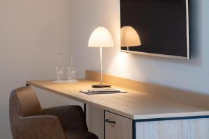 Fotografija u galeriji objekta Hotel Winkelried am See u gradu Stansstad