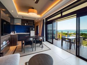 Kuchyň nebo kuchyňský kout v ubytování One Suite THE TERRACE
