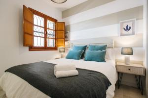 Posteľ alebo postele v izbe v ubytovaní Encarnación Suite Apartment