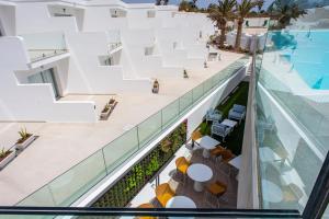 an aerial view of a building with a pool at Hotel Taimar in Costa Calma