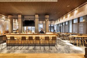 Restoran või mõni muu söögikoht majutusasutuses HYPERION Hotel Leipzig