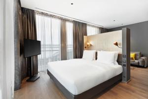 Voodi või voodid majutusasutuse HYPERION Hotel Leipzig toas
