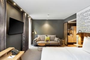Voodi või voodid majutusasutuse HYPERION Hotel Leipzig toas