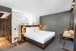 Voodi või voodid majutusasutuse HYPERION Hotel Leipzig toas