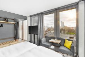Voodi või voodid majutusasutuse HYPERION Hotel Leipzig toas