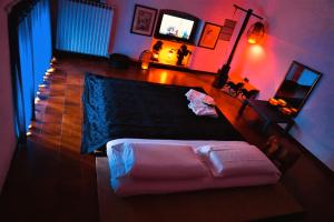 Een bed of bedden in een kamer bij Alchimia SPA & Centro Benessere