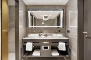 Vannituba majutusasutuses HYPERION Hotel Leipzig