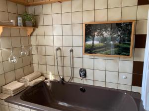 Koupelna v ubytování Vias Ferienwohnungen + 55 fotografií