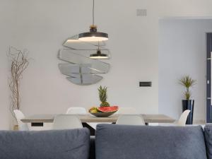 a dining room with a table and chairs at Villa Vine by Interhome in Marčana