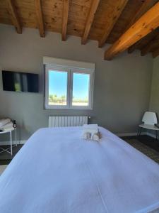 Cama o camas de una habitación en Villa Salada Playa