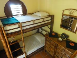Postel nebo postele na pokoji v ubytování Troncones Point Hostel