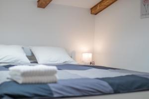 Postel nebo postele na pokoji v ubytování Apartmani Mario