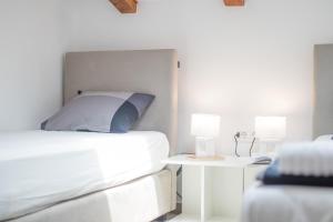 Postel nebo postele na pokoji v ubytování Apartmani Mario