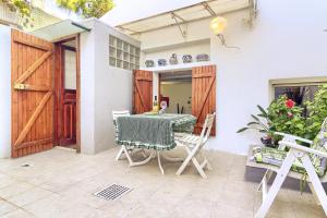 Patio alebo iná vonkajšia časť ubytovania Casa Ginepro