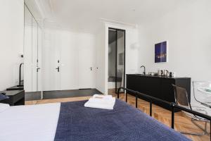 Posteľ alebo postele v izbe v ubytovaní Apartment Copernicus No. 25