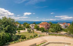 an aerial view of a town with houses and trees at VILA STEMARK in Njivice