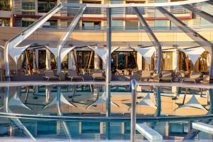 a swimming pool on the side of a cruise ship at Vega Hotel in Mamaia