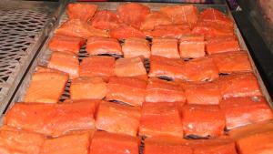 a bunch of peeled salmon on a grill at Kelli Creek Cottage - REDUCED PRICE ON TOURS in Juneau