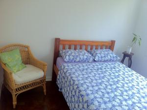 Cama ou camas em um quarto em Zen Hotel Brasil