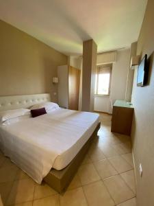 Postel nebo postele na pokoji v ubytování Hotel Joseph
