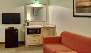 A kitchen or kitchenette at Thompson's Best Value Inn & Suites