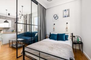 Posteľ alebo postele v izbe v ubytovaní Nowiniarska 8 by Noclegi Renters + 13 fotografií
