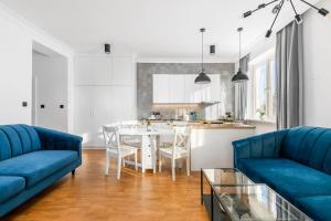 Posedenie v ubytovaní Nowiniarska 8 by Noclegi Renters