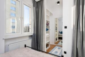 Posteľ alebo postele v izbe v ubytovaní Nowiniarska 8 by Noclegi Renters