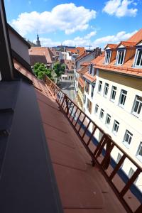 a view of a city from the roof of a building at Pretti Apartments - NEUES modern eingerichtetes Apartment - mitten im Stadtzentrum in Bamberg