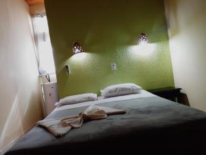Postel nebo postele na pokoji v ubytování Hotel Pousada Viking