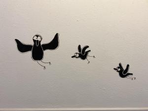 a painting of birds on a wall at Hotel Credible in Nijmegen