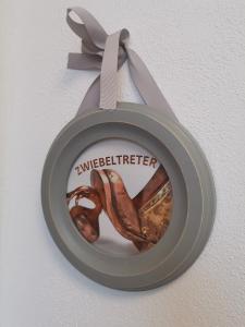 a sign on a wall with some food on it at Pretti Apartments - NEUES modern eingerichtetes Apartment - mitten im Stadtzentrum in Bamberg
