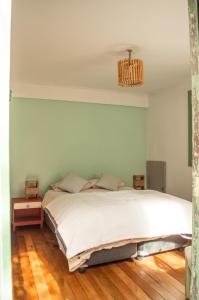 Cama ou camas em um quarto em Eco-Hostal Tambo Verde