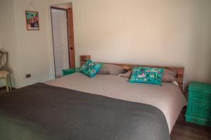 Cama ou camas em um quarto em Eco-Hostal Tambo Verde