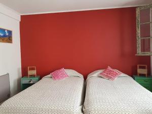 Cama ou camas em um quarto em Eco-Hostal Tambo Verde