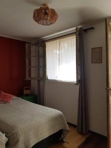 Cama ou camas em um quarto em Eco-Hostal Tambo Verde