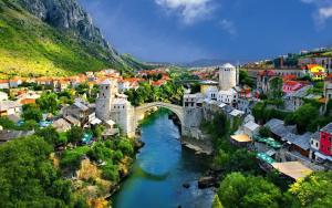 a city with a bridge over a river at Cheap house near the center of the city in Mostar
