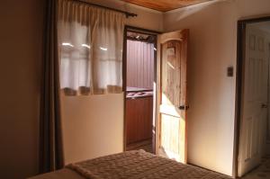 Cama ou camas em um quarto em Eco-Hostal Tambo Verde