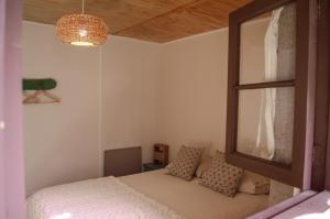 Cama ou camas em um quarto em Eco-Hostal Tambo Verde