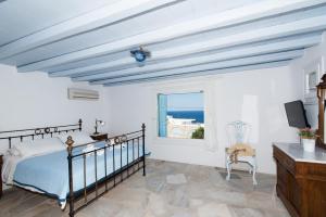 Letto o letti in una camera di Villa Boufla