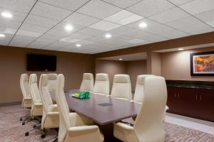 a conference room with a table and chairs at Holiday Inn La Mirada Buena Park by IHG in La Mirada