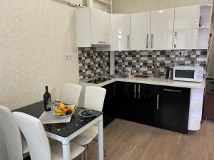 Kuchyň nebo kuchyňský kout v ubytování Studio with separate bed room + 9 fotografií