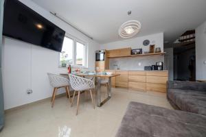 Kuchyň nebo kuchyňský kout v ubytování Palit 497/D, Apartment F