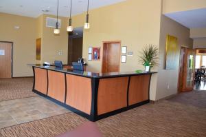 a lobby with a reception desk in a hospital at Cobblestone Inn & Suites - Newton in Newton
