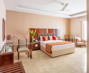 Orchha Palace and Convention Centre客房内的一张或多张床位