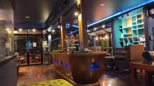 The lounge or bar area at Foresto Sukhothai Guesthome