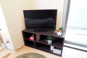 Телевизор и/или развлекательный центр в 渋谷道玄坂401